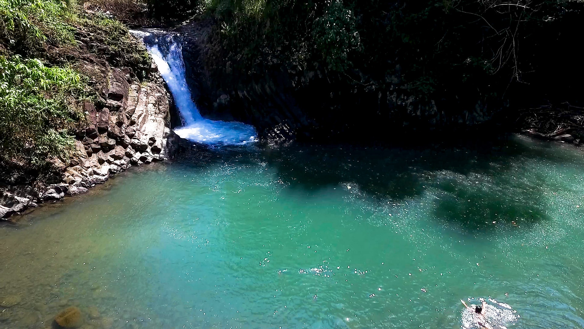dunsulan falls drone image with melody somido swimming
